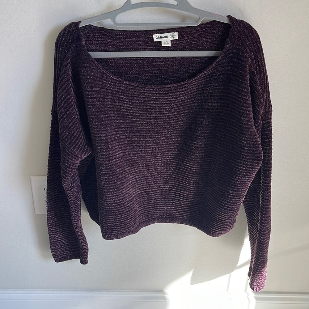 Eggplant colored sweater, loose fitting.
